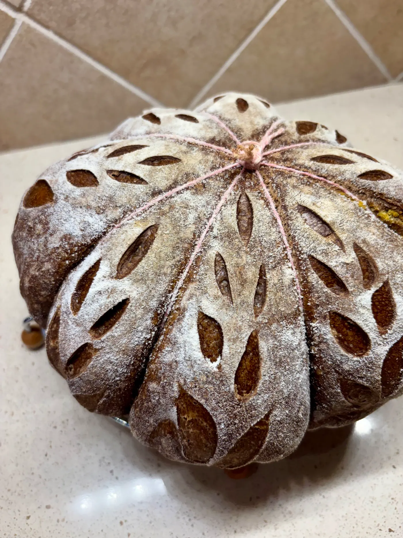 Decoratively scored sourdough loaf